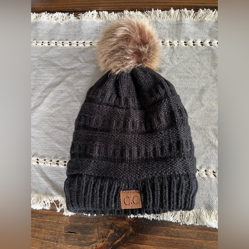 C.C Black Knit Beanie with Faux Fur Pom, fleece lined, GUC, one size.